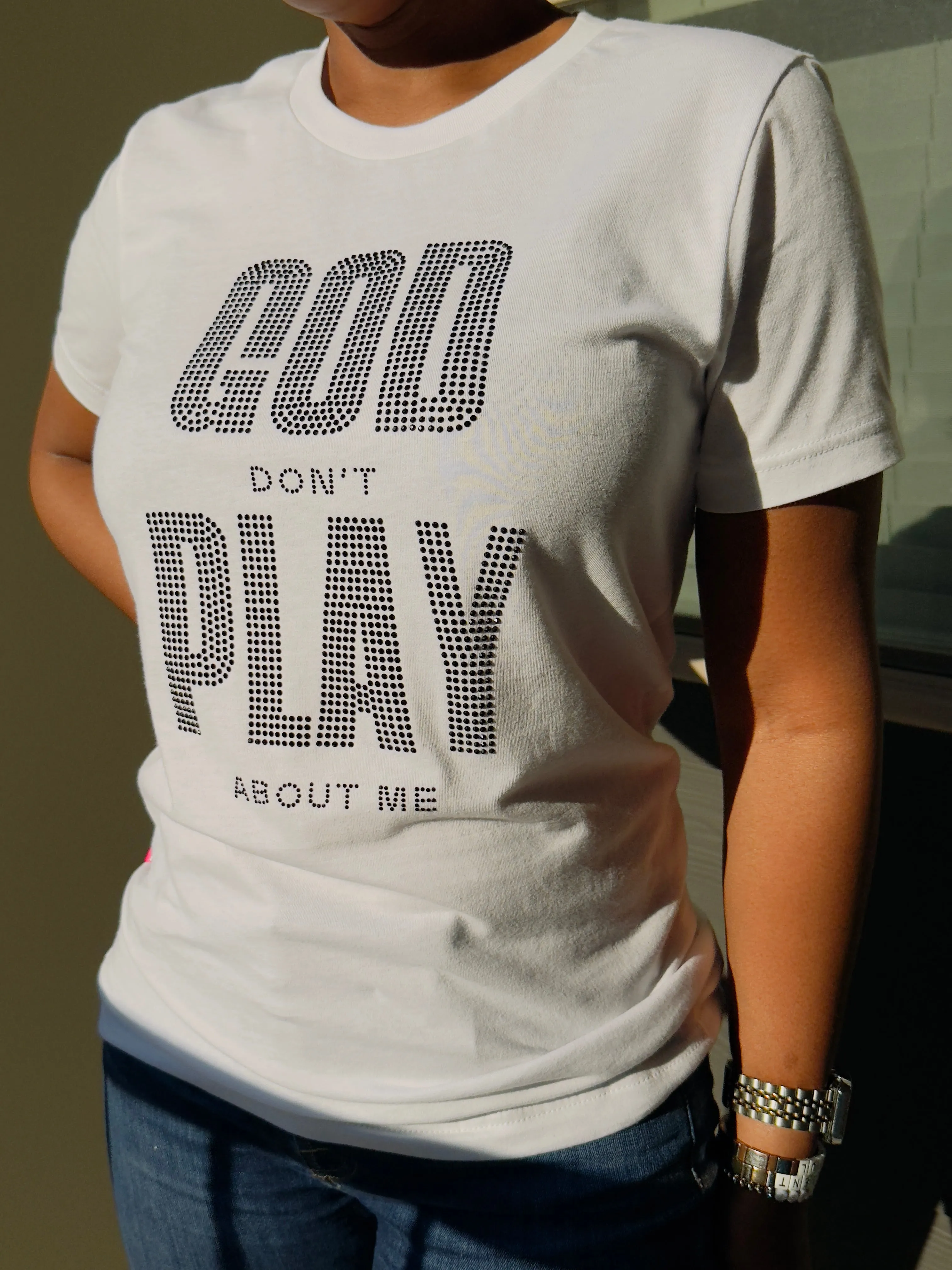 “God Don’t Play About Me” Rhinestone T-Shirt – Sparkle with Faith and Style