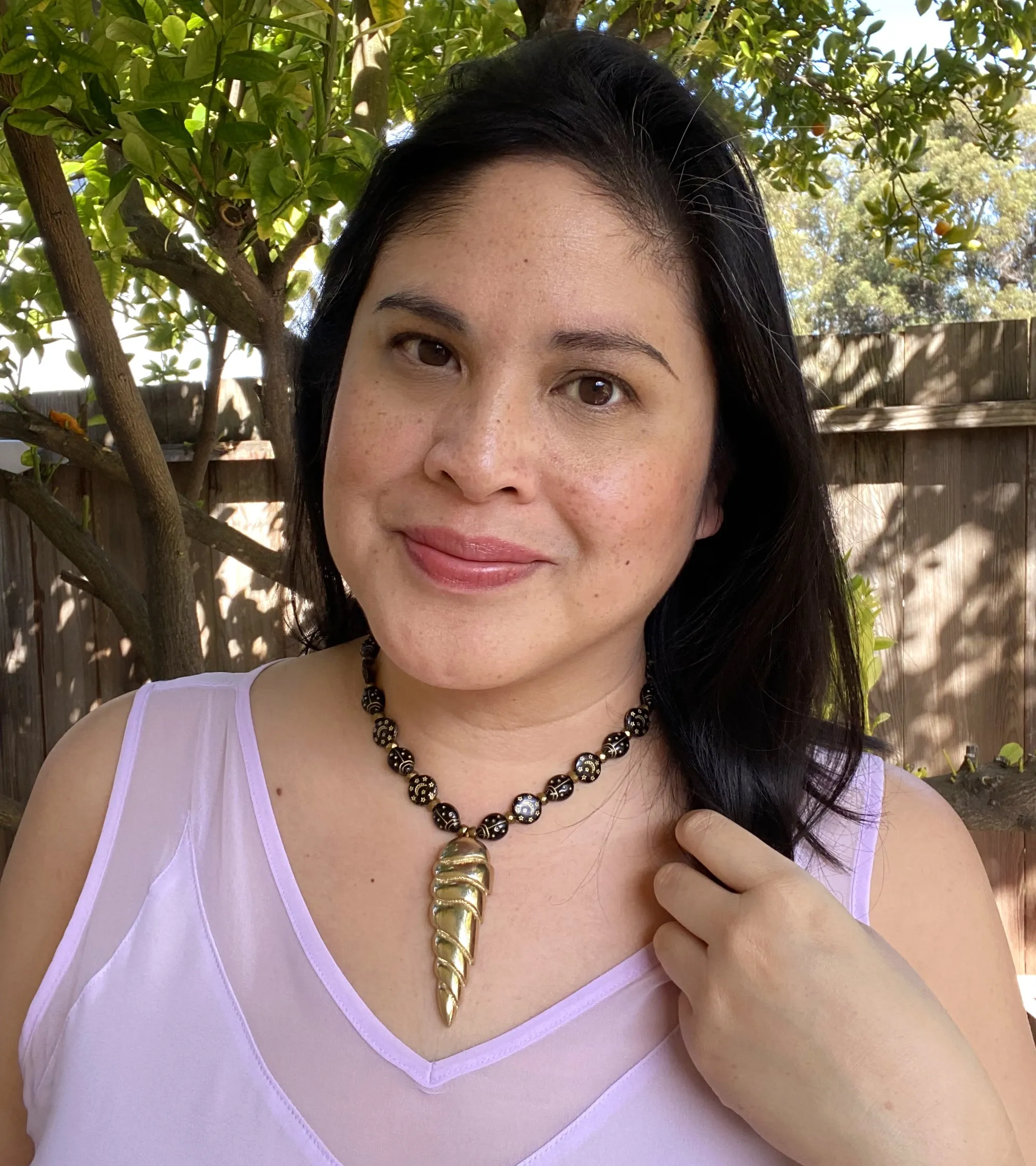 Golden spearhead necklace
