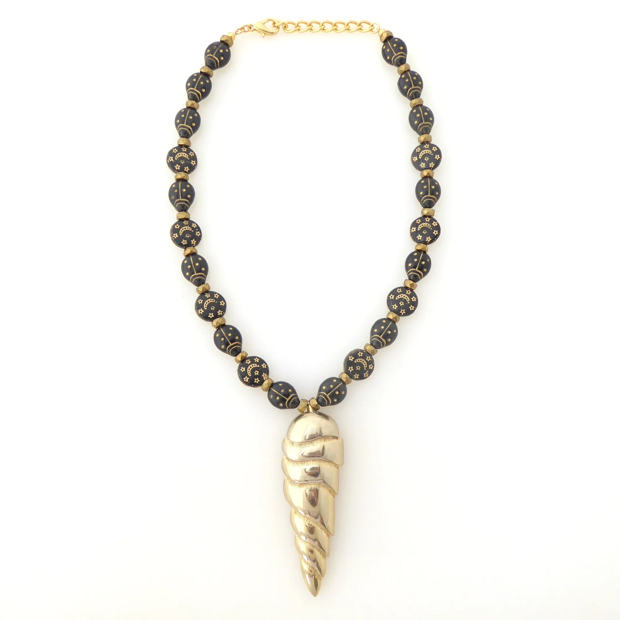 Golden spearhead necklace