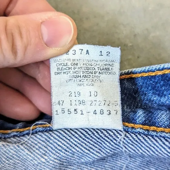 Vintage Levi's 550 High Rise Blue Distressed Denim Cut-Off Jean Shorts
