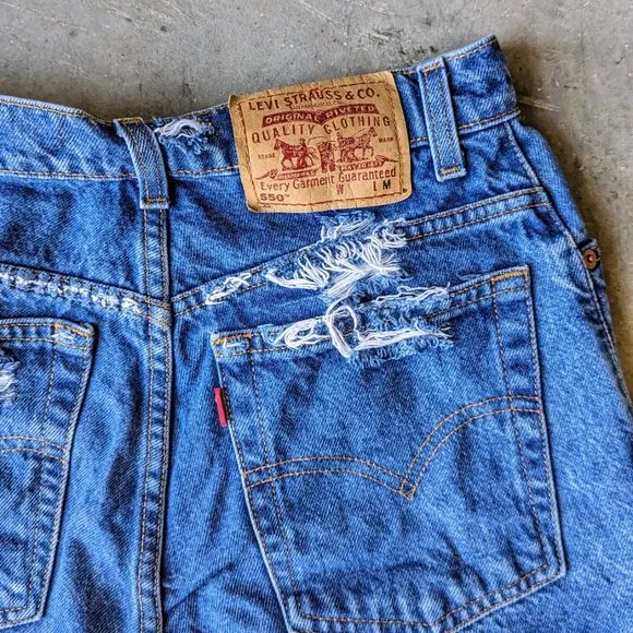 Vintage Levi's 550 High Rise Blue Distressed Denim Cut-Off Jean Shorts