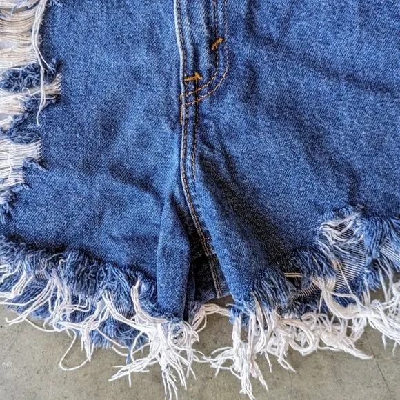 Vintage Levi's 550 High Rise Blue Distressed Denim Cut-Off Jean Shorts