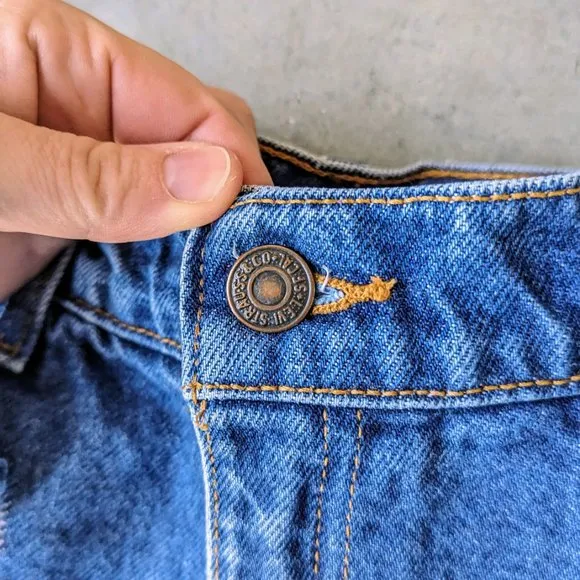 Vintage Levi's 550 High Rise Blue Distressed Denim Cut-Off Jean Shorts