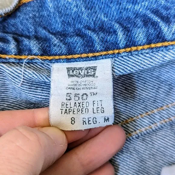 Vintage Levi's 550 High Rise Blue Distressed Denim Cut-Off Jean Shorts